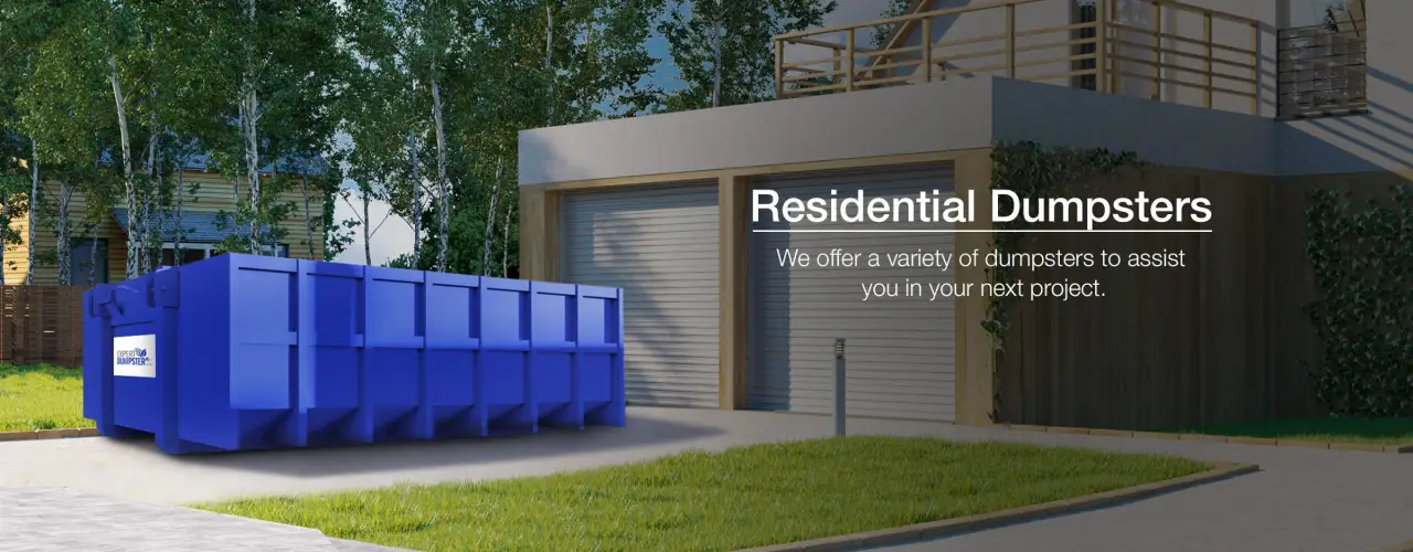 dumpster on driveway in front of garage