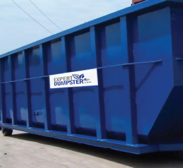 large blue dumpster with an Expert Dumpster sign
