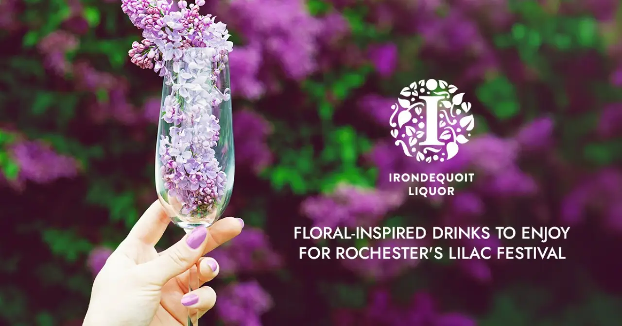a hand holds a champagne glass with lilacs; text promotes floral drinks for the Lilac Festival