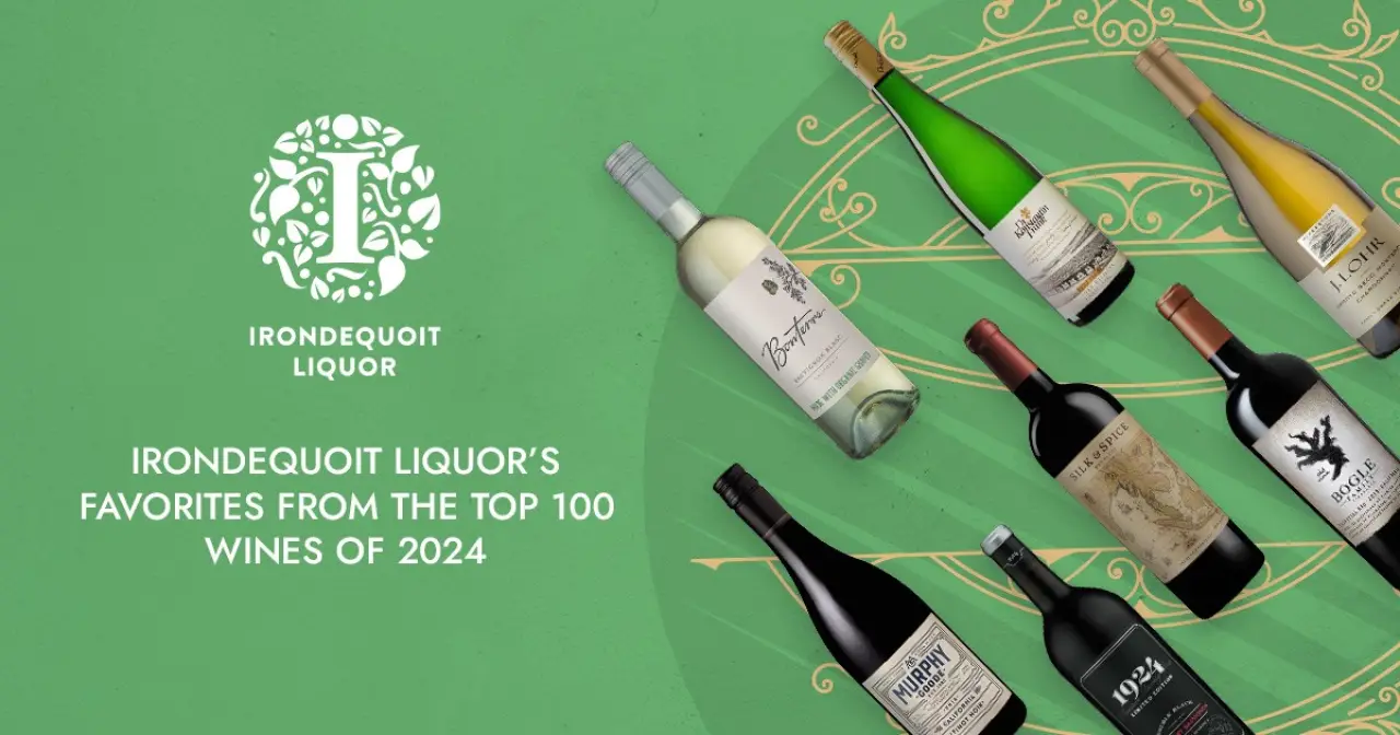 seven wine bottles displayed diagonally on a green background with Irondiquoit Liquors logo