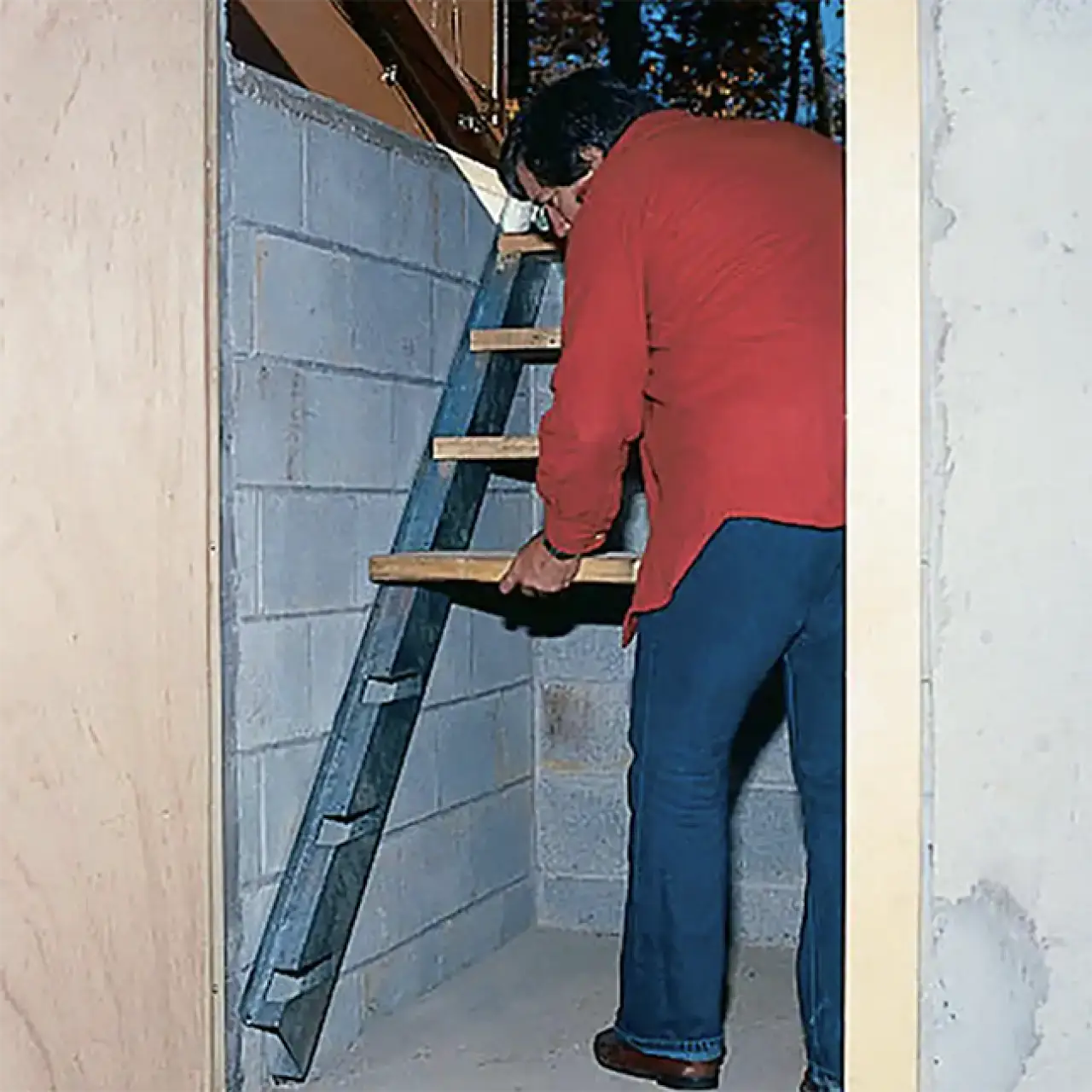 man installing stair stringers