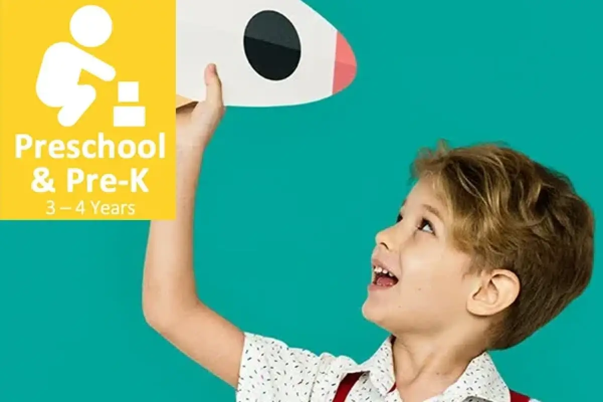 Young boy holding a paper rocket, with Preschool Pre-K 3–4 Years text on yellow box.