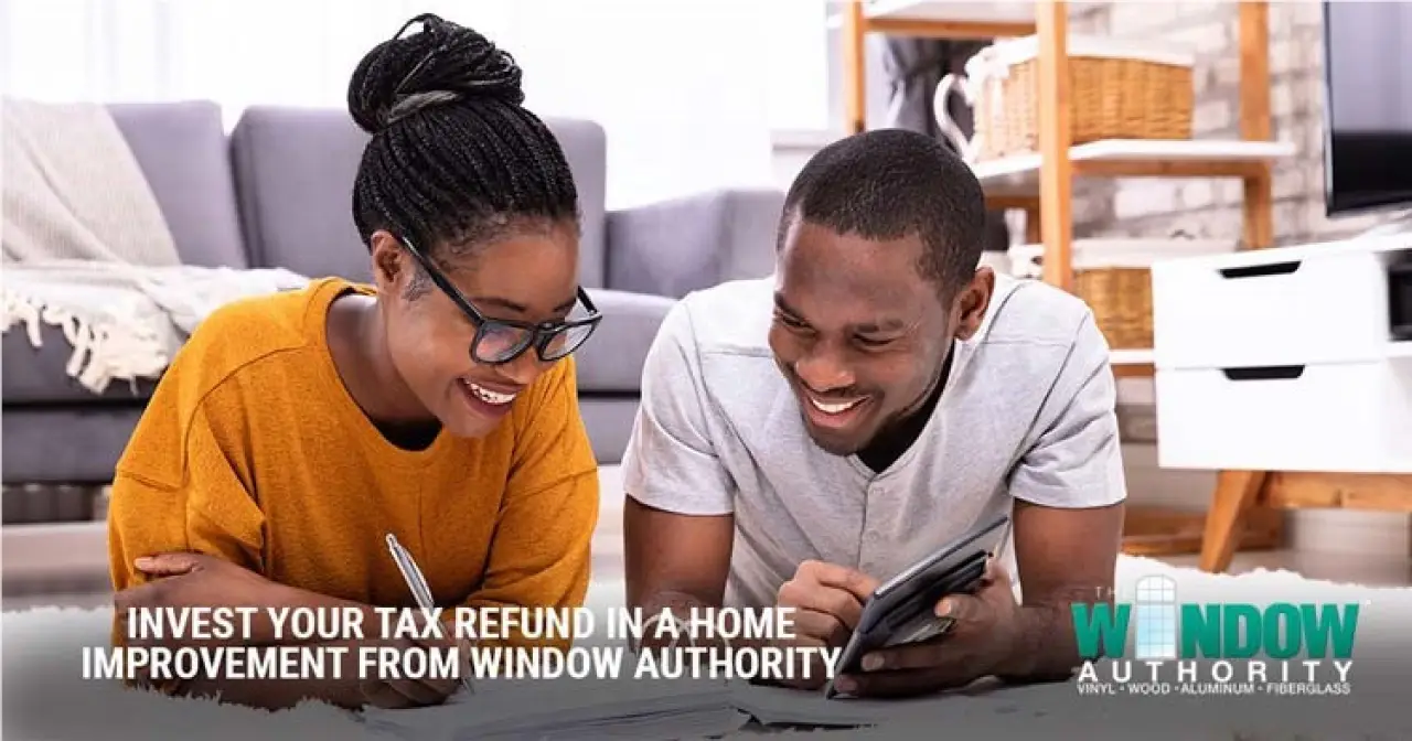 Couple reviewing home improvement plans and tax refund investment ideas.