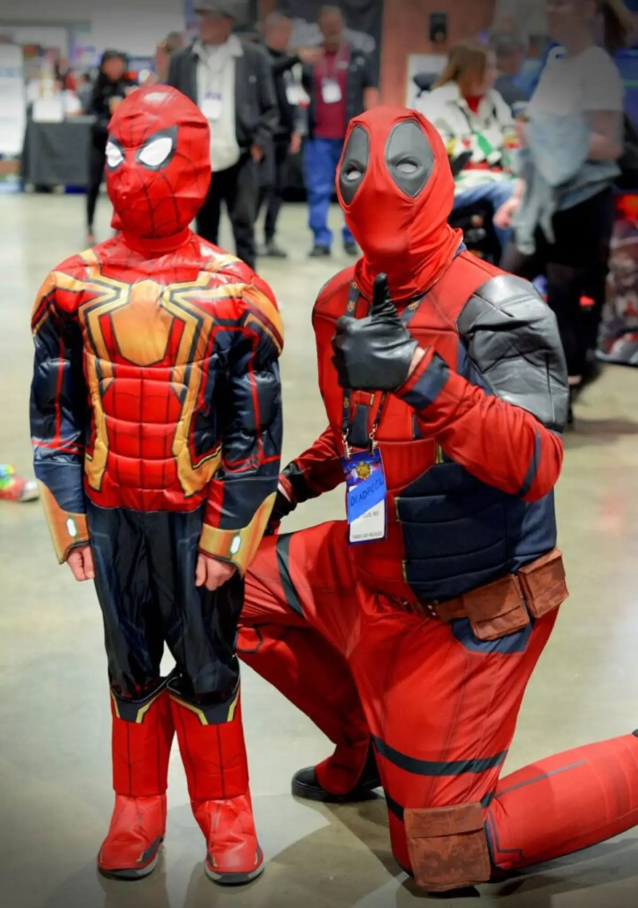 Family cosplay attendees enjoying Pinball Expo