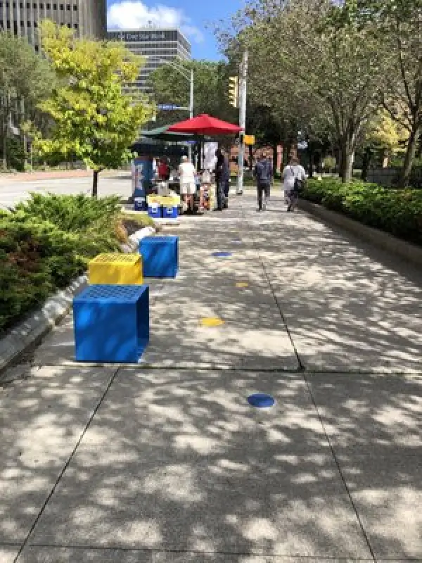 Yellow and blue thermoplastic dots serve as trail markers