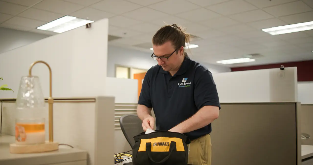 LyteSpeed engineer preparing equipment for an on-site network job