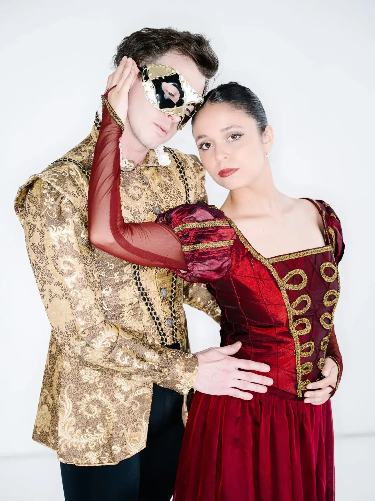 Two ballet dancers in ornate Romeo and Juliet costumes.