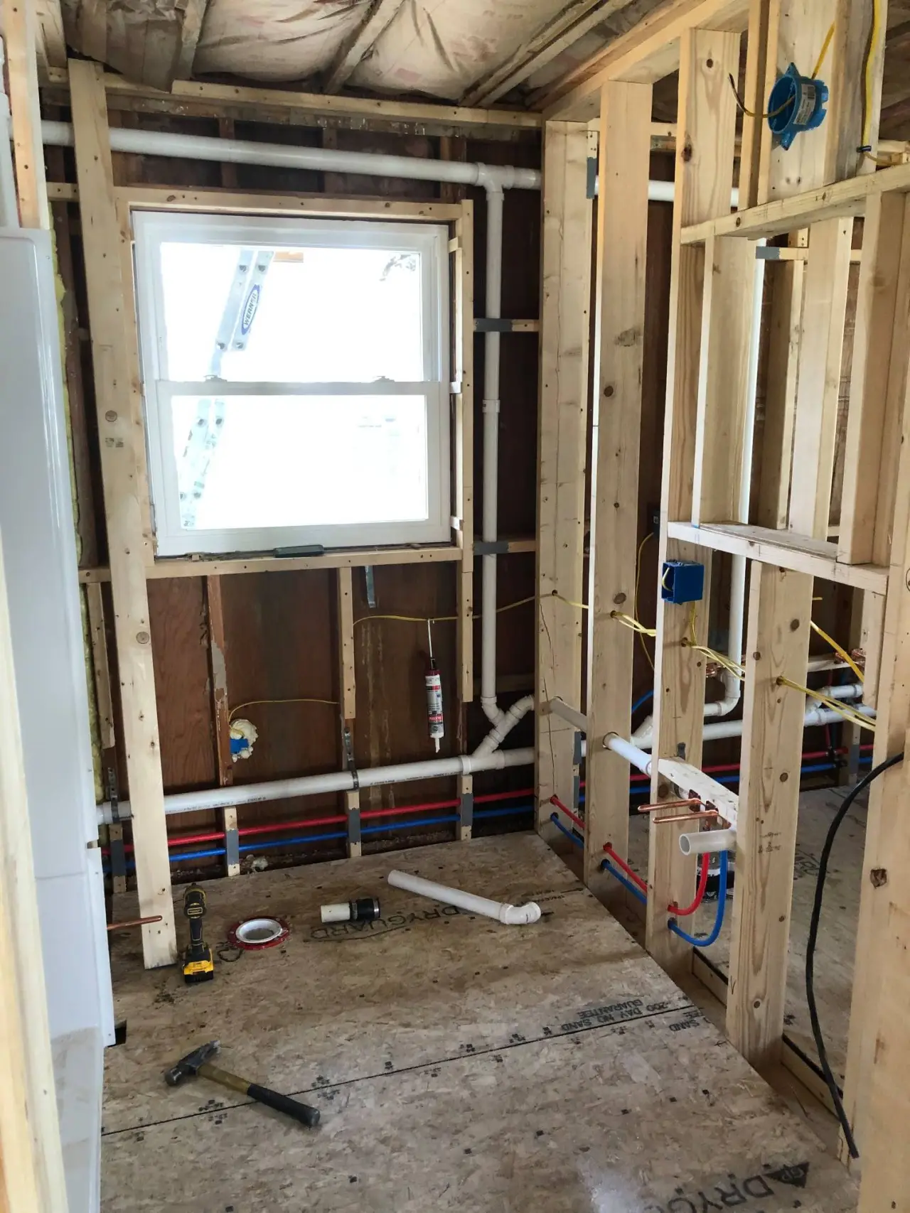 Plumbing installation during a new construction buildout