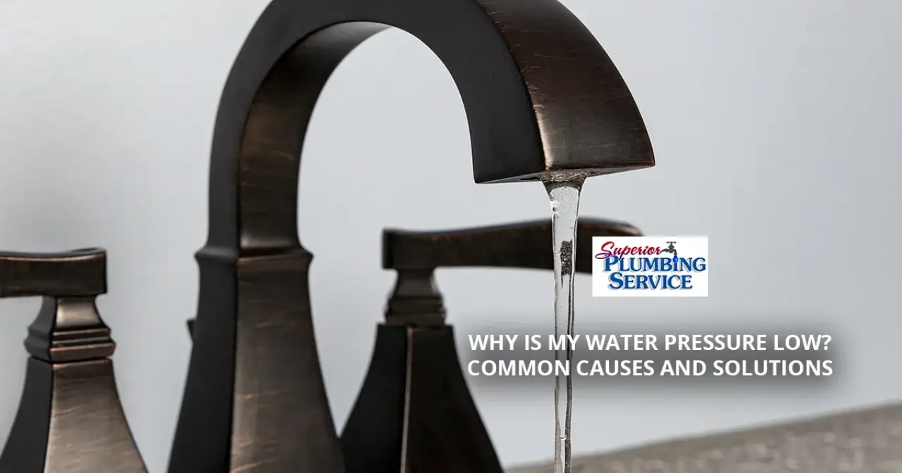 A dark metal faucet with a thin stream of water and text about low water pressure.