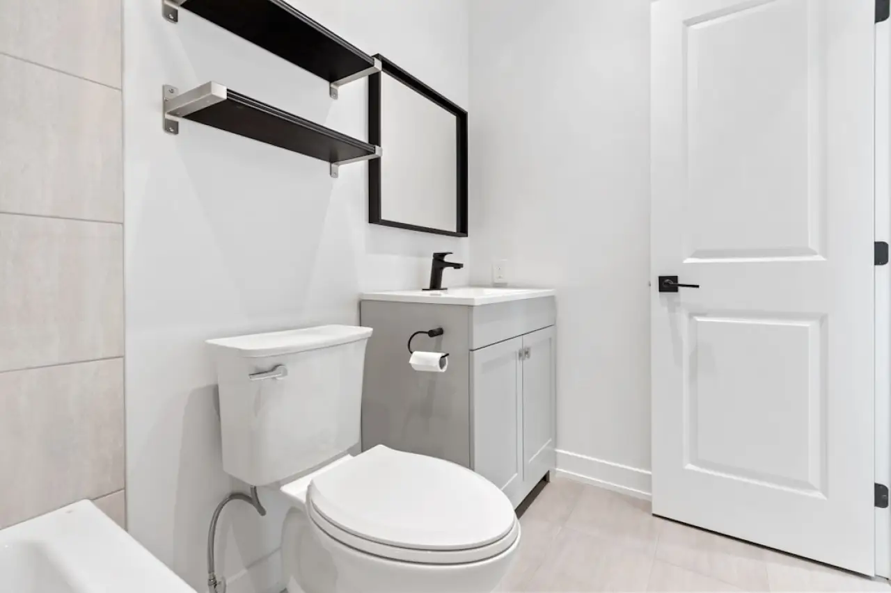 Newly installed toilet in a residential bathroom