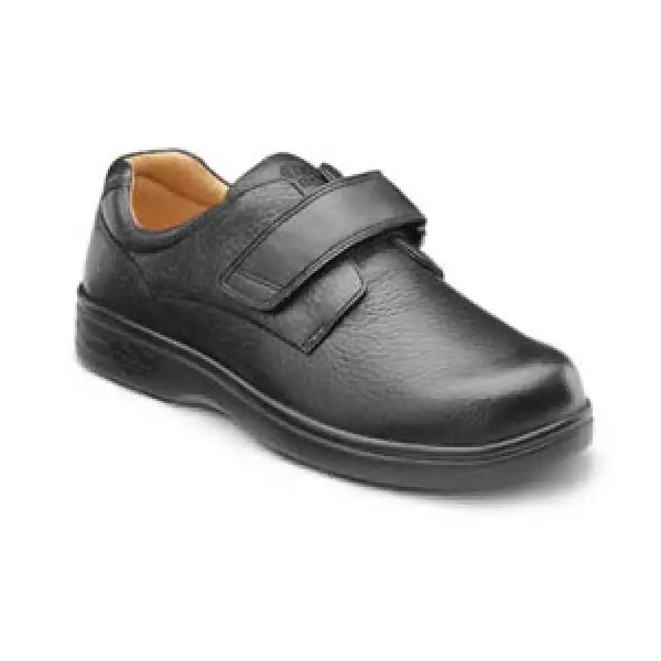 Black diabetic shoe with adjustable hook-and-loop strap.