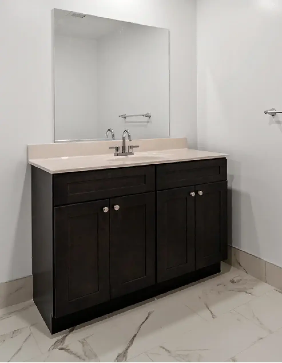 Contemporary bathroom vanity in an Empire Blvd. Estates apartment