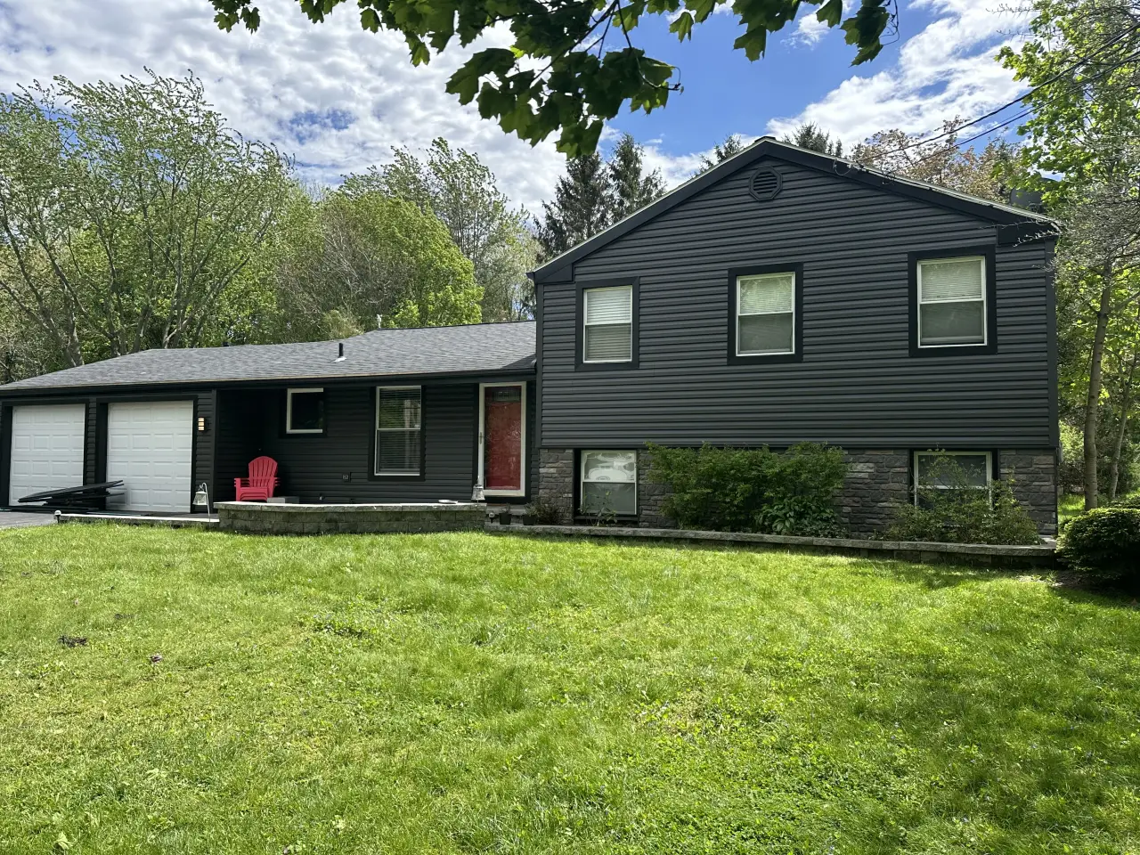 New siding on a black house