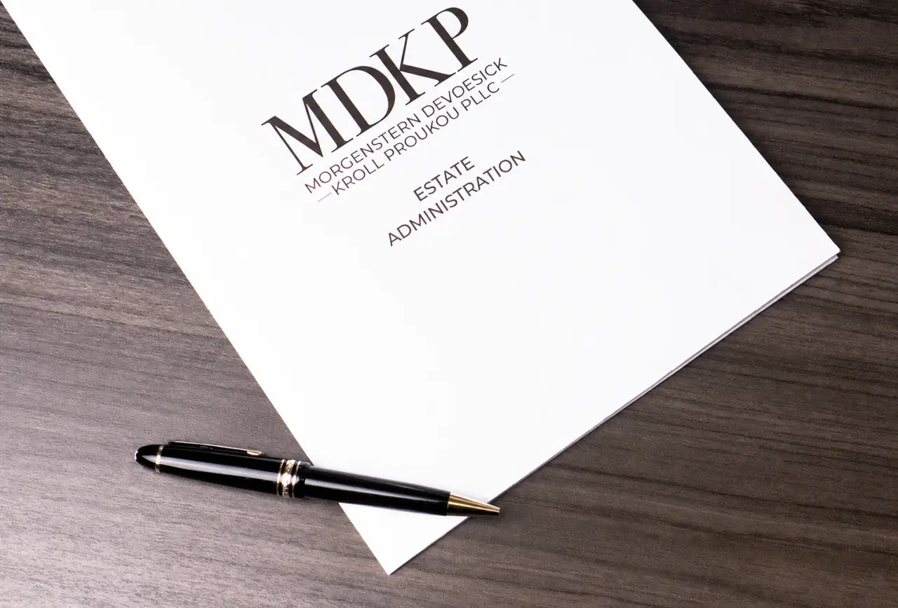 White paper on desk with elder law medicaid planning