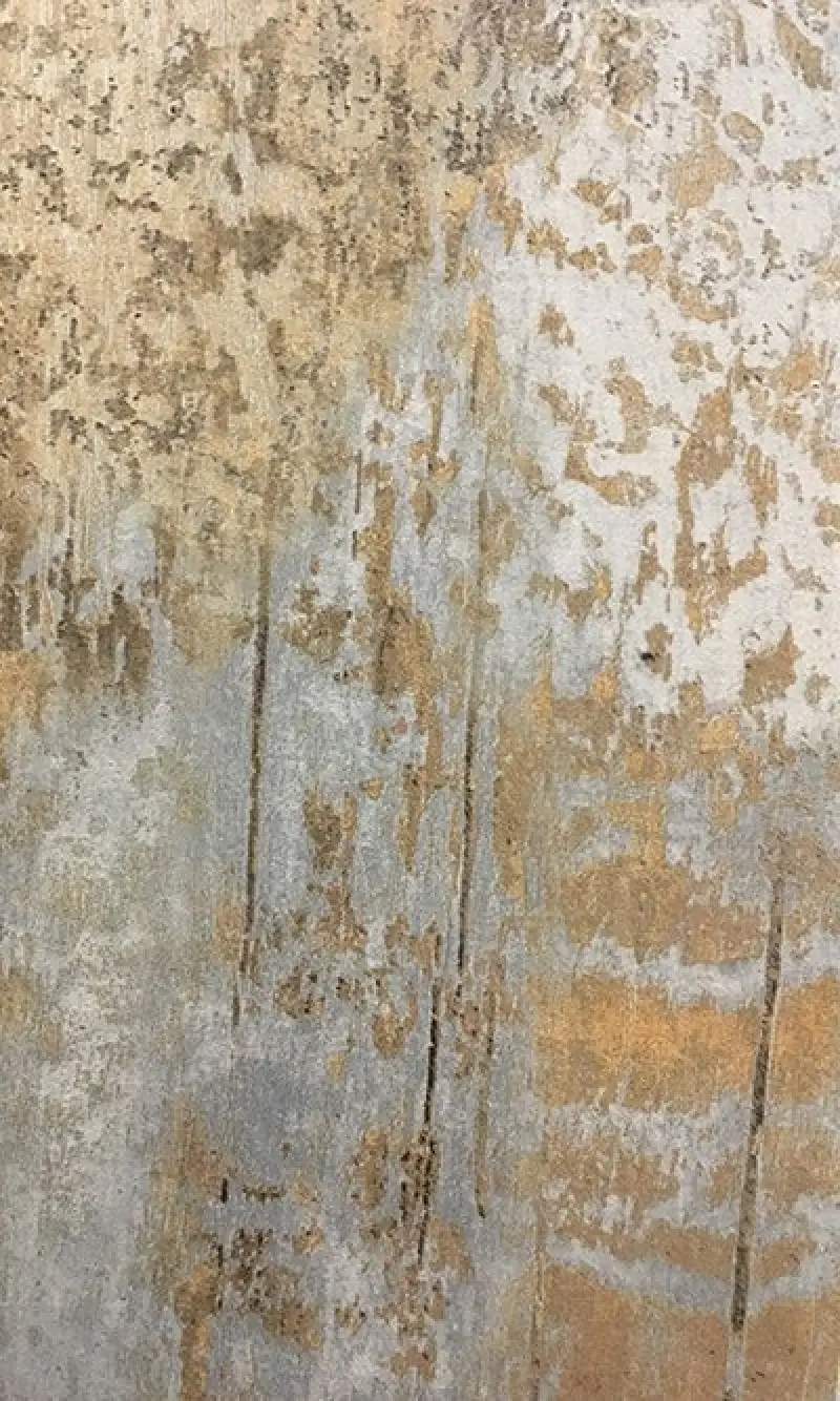 Close-up of distressed gray and tan wood-look porcelain tile.