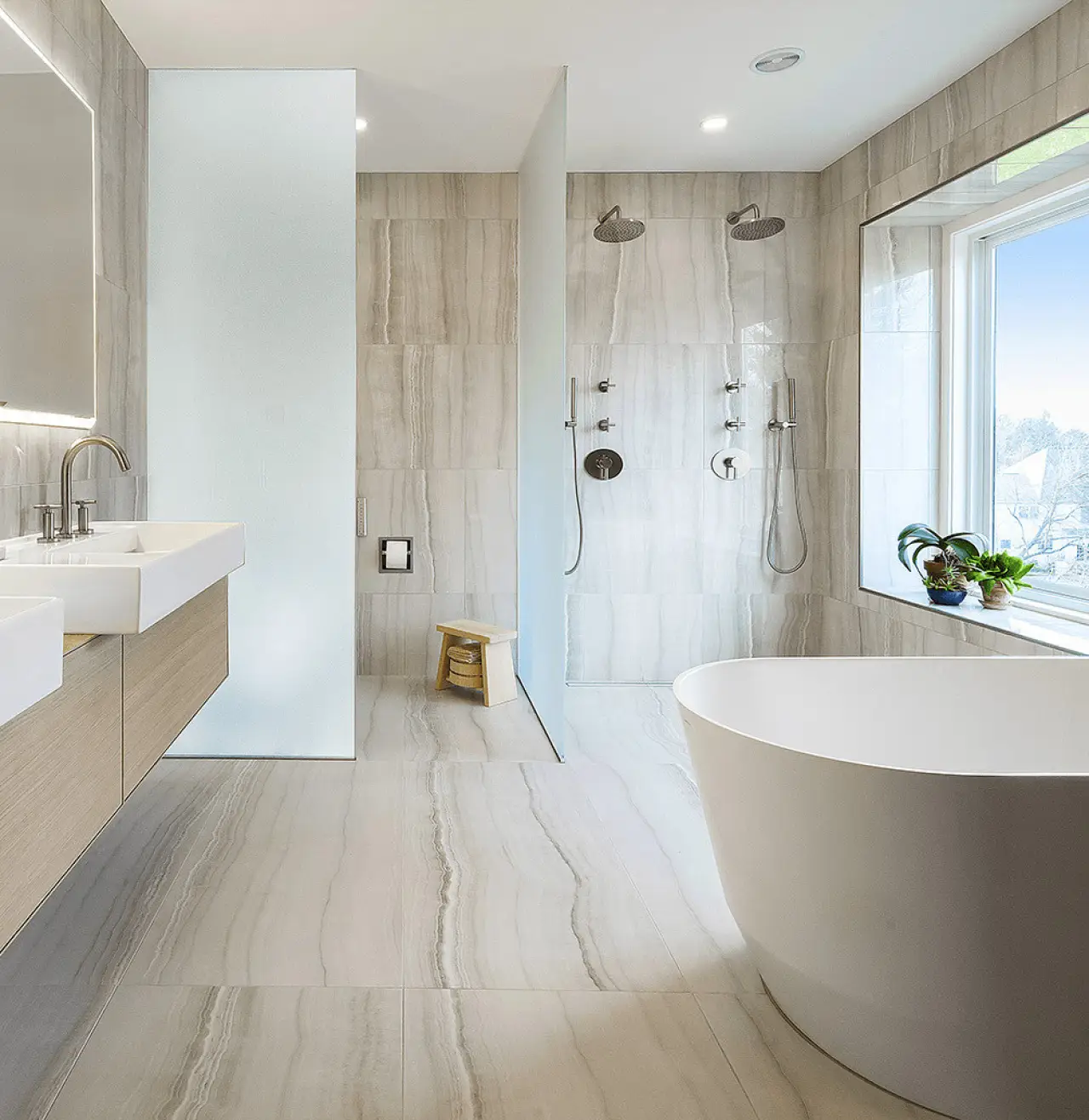 Model of a white bathroom in a showroom.