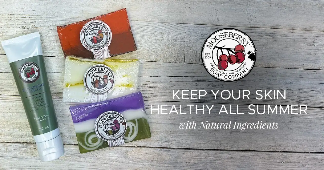 Mooseberry soaps and lotion with logo and “Keep your skin healthy all summer” text on wood.