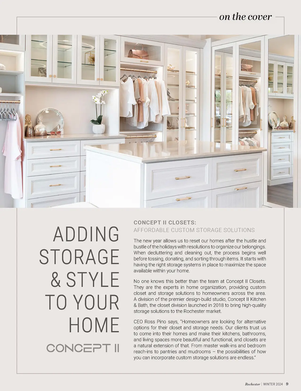 Walk-in closet with white shelves, drawers, and hanging space, neatly organized with clothes.