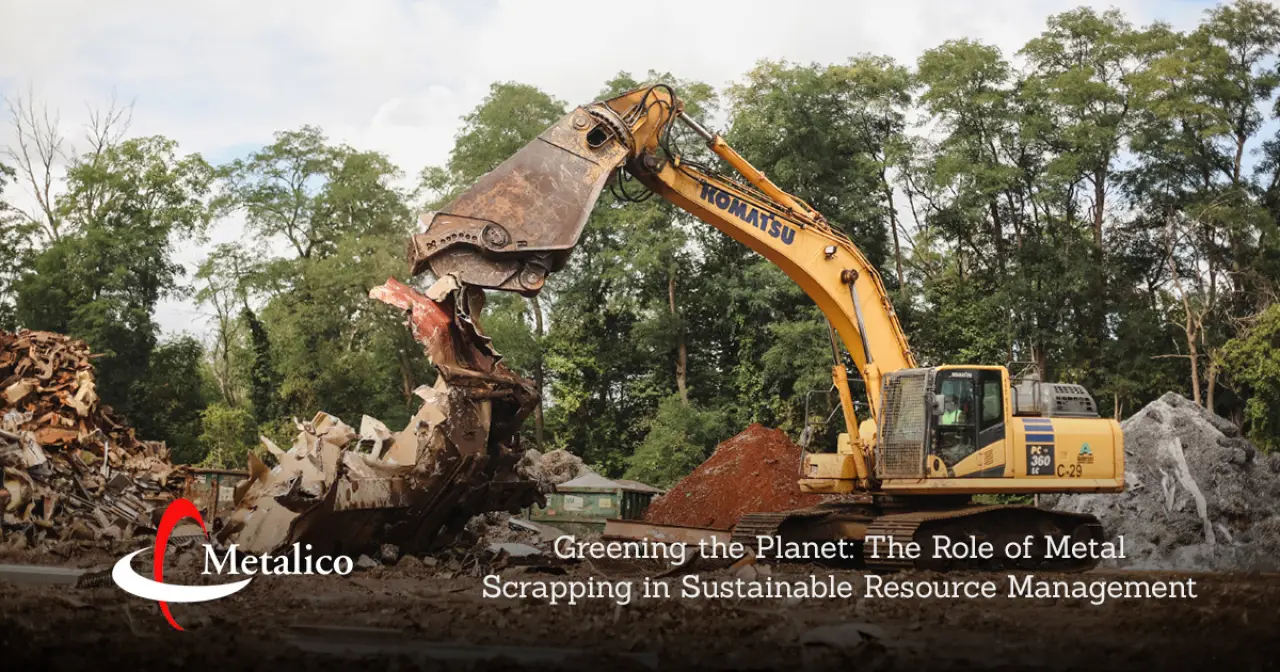 backhoe with magnetic attachemnt in scrap metal yard