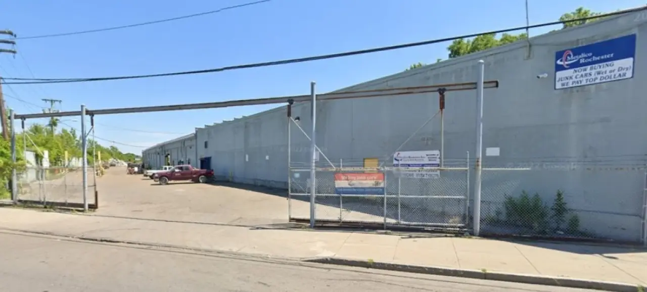 commercial building gated entrance metalico portland avenue in rochester ny