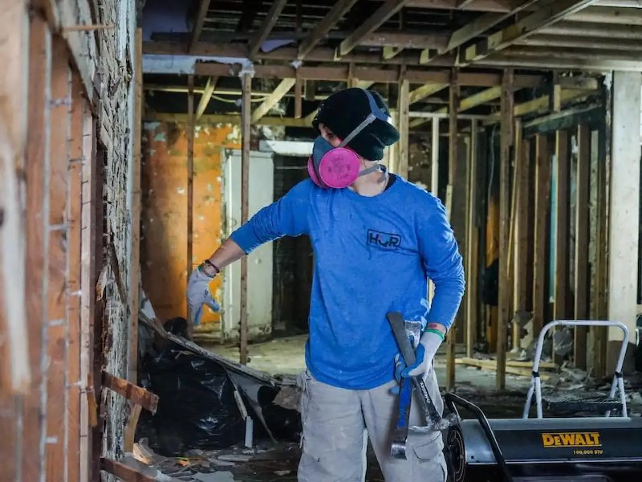 employee working on a partial demolition
