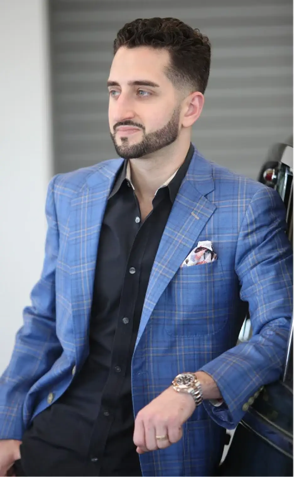 Adrian Jules client wearing a custom tailored plaid sport coat