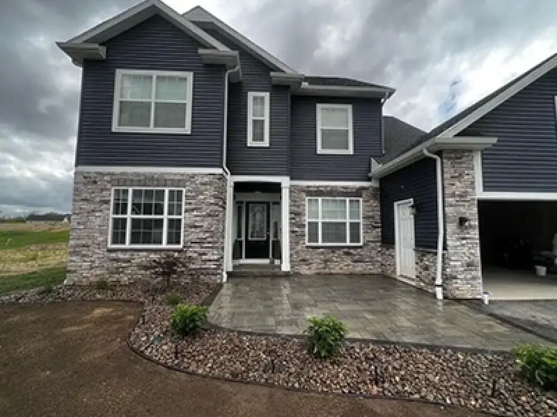 home with new front paver patio