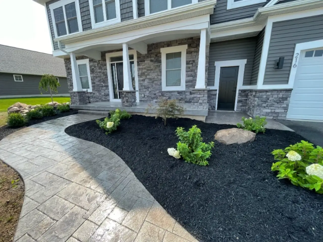 new concrete walkway and mulching