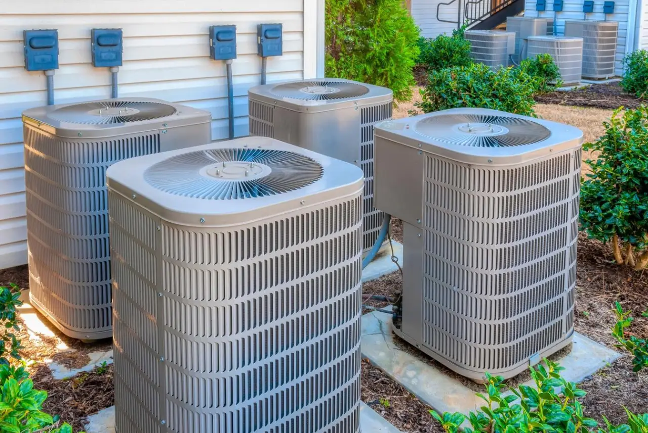 Central air conditioner condenser units outside a home