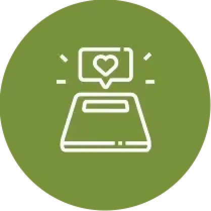 white heart chat icon above a tablet screen on a green circular background