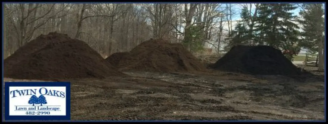 three colors of mulch with twin oaks logo