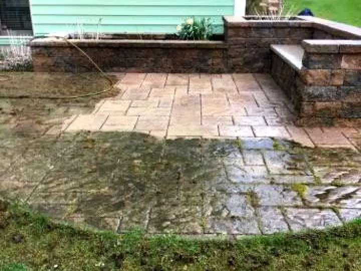 in progress photo of power washed handscaping