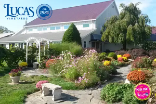 The Lucas Vineyards tasting room behind flowering garden beds