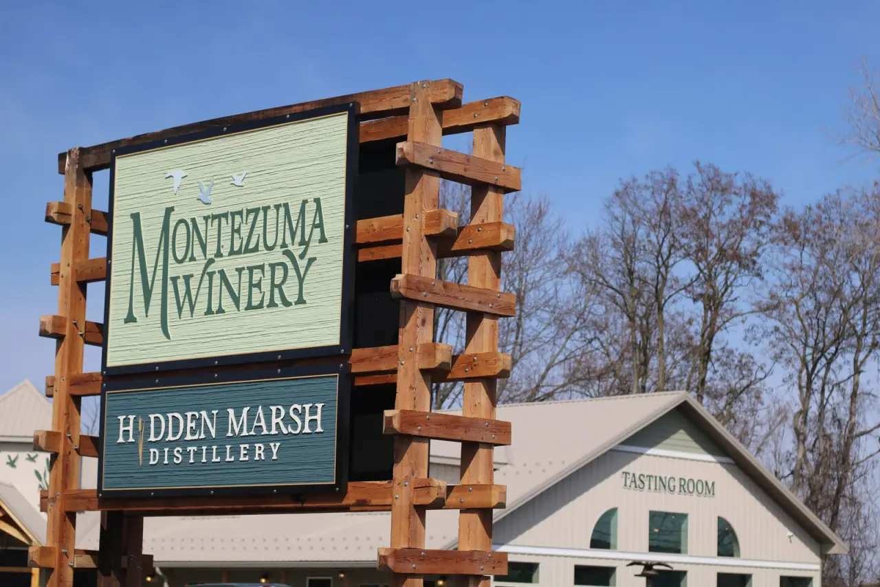The Montezuma Winery and Hidden Marsh Distillery roadside sign