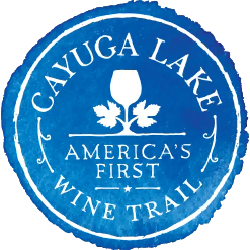blue circular logo with a wine glass reads Cayuga Lake Americas First Wine Trail