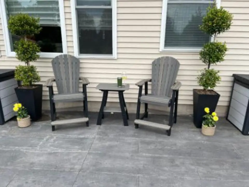 grey adirondack chairs with table