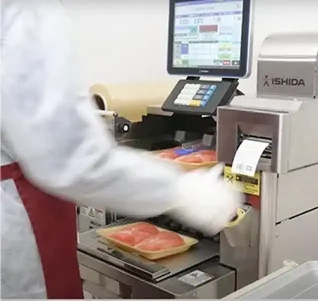 ishida scales used to label raw meat at grocery store
