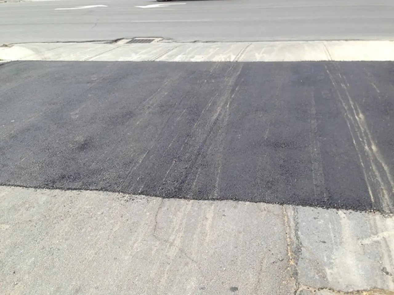 New asphalt in a parking lot.