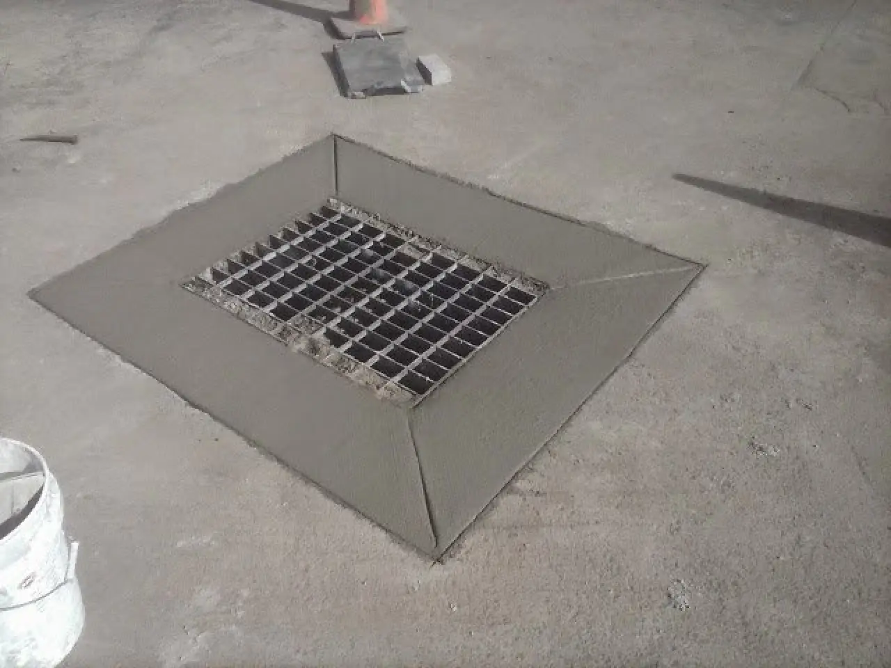 Concrete grate in the ground