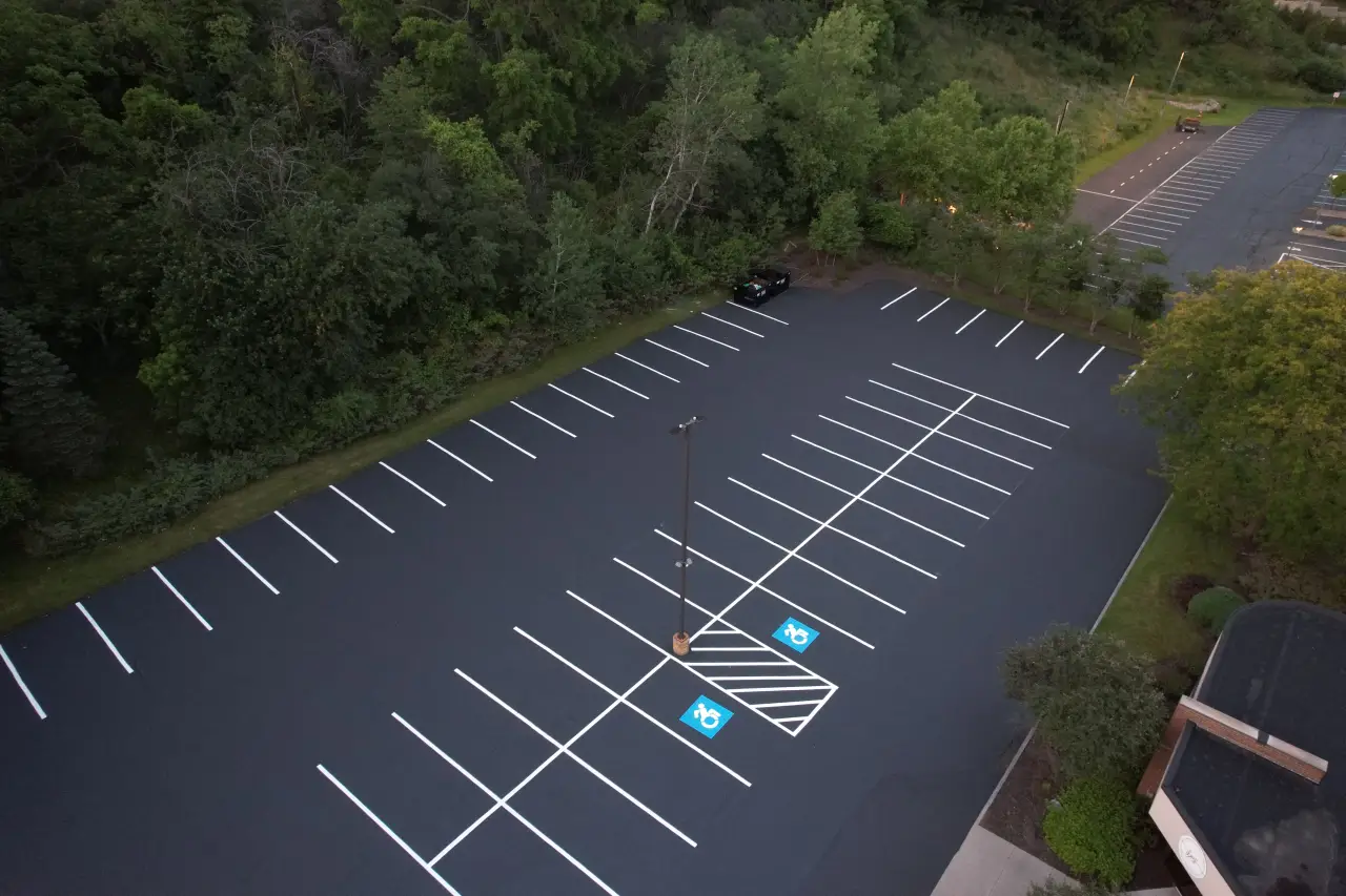 Freshly sealcoated commercial parking lot
