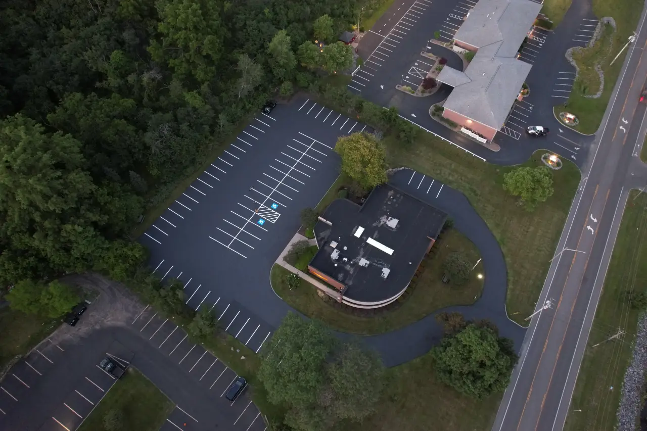 Sealcoat parking lot project for commercial property