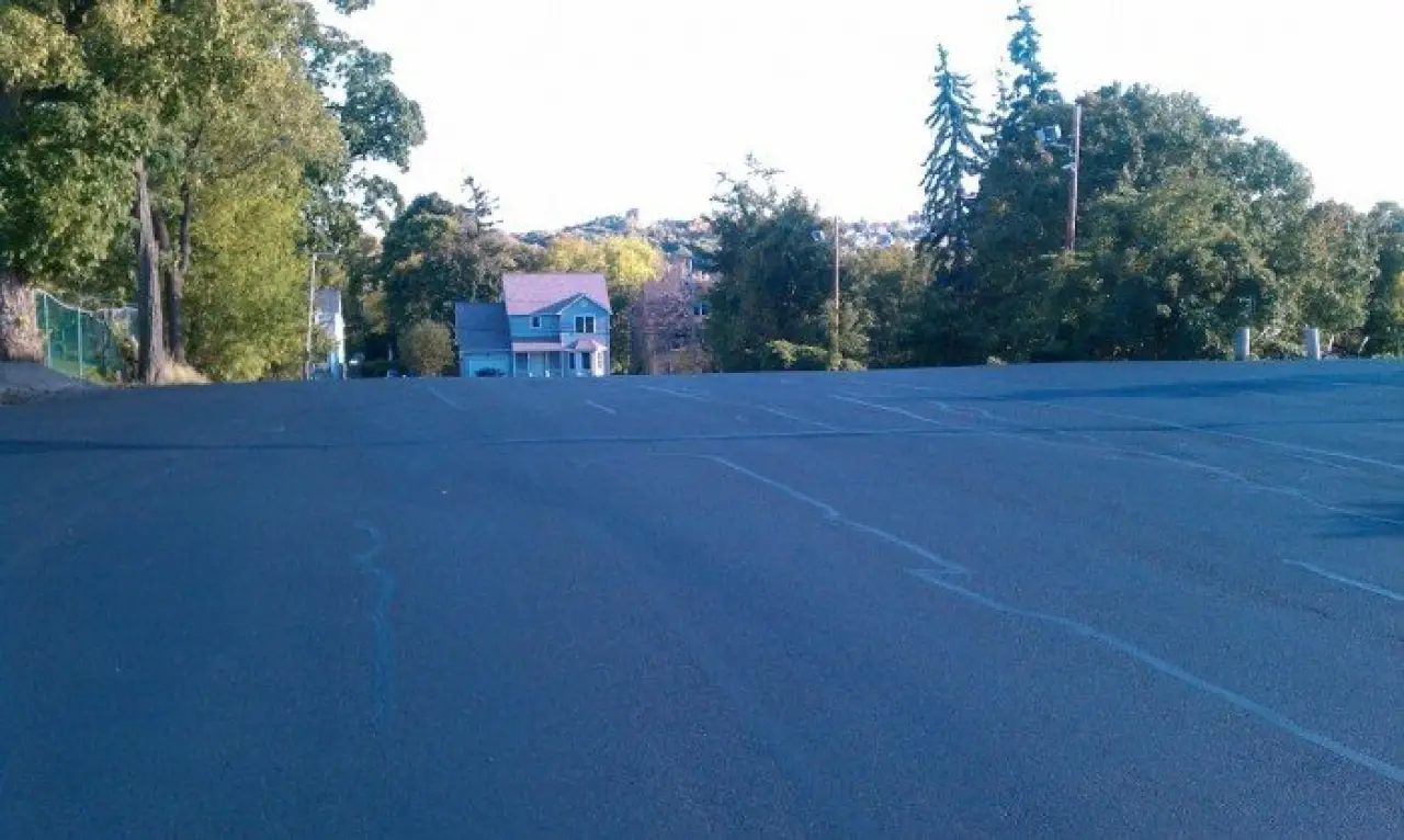 A freshly paved parking lot.