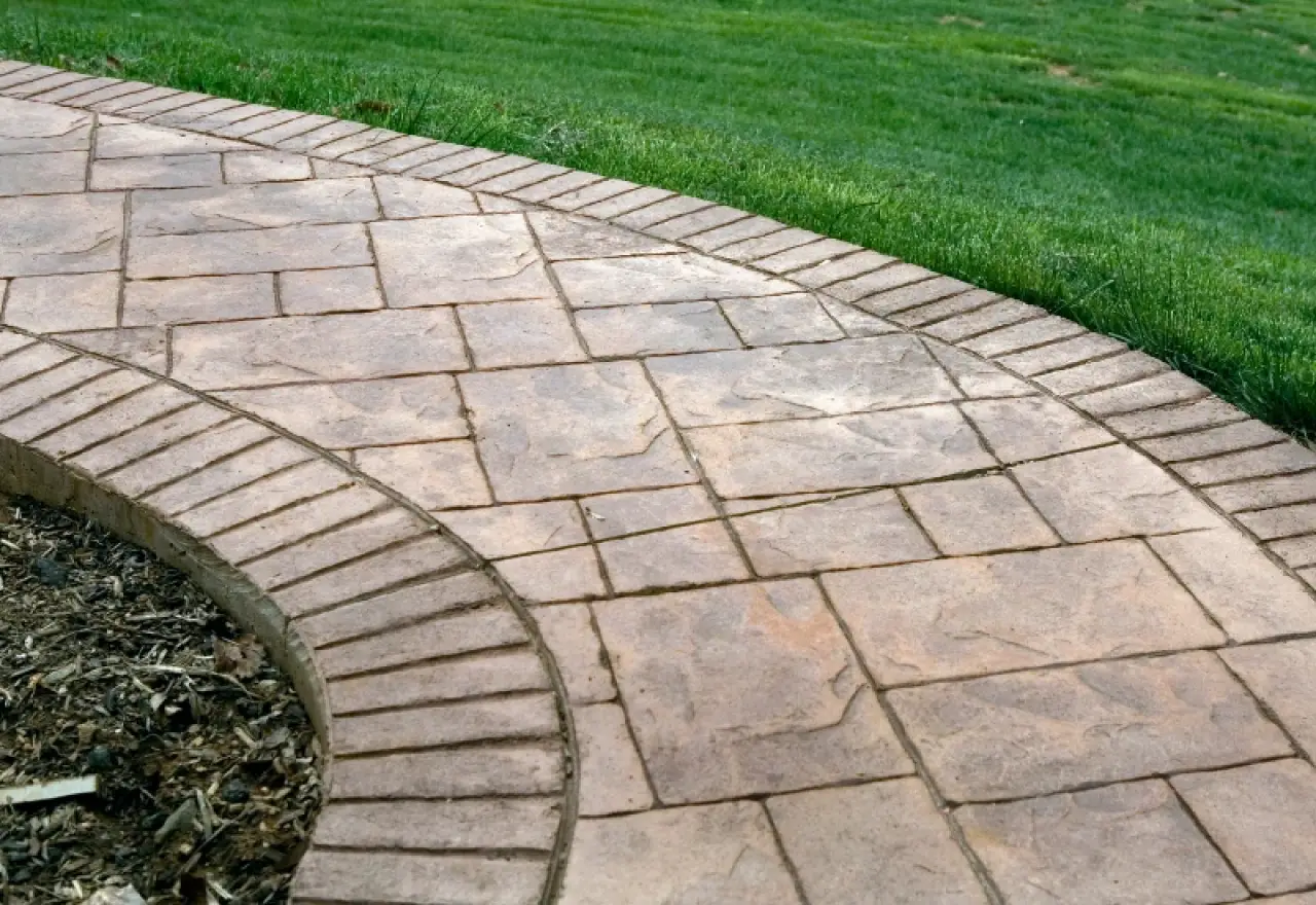 Stamped concrete walkway leading to a Syracuse, NY home