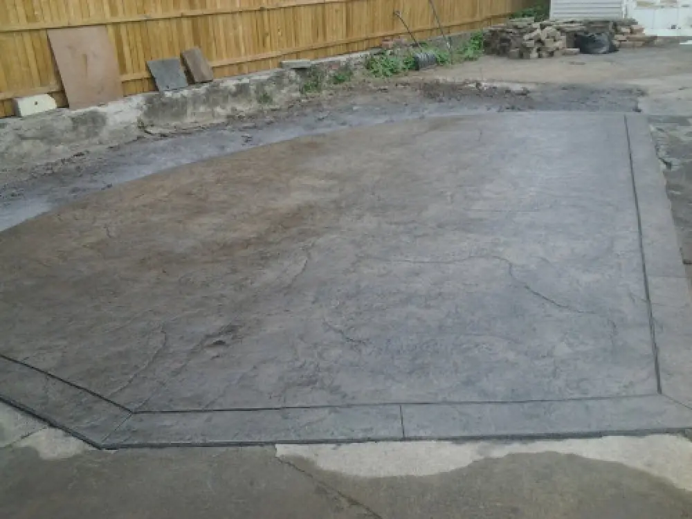 Concrete patio and walkway installation