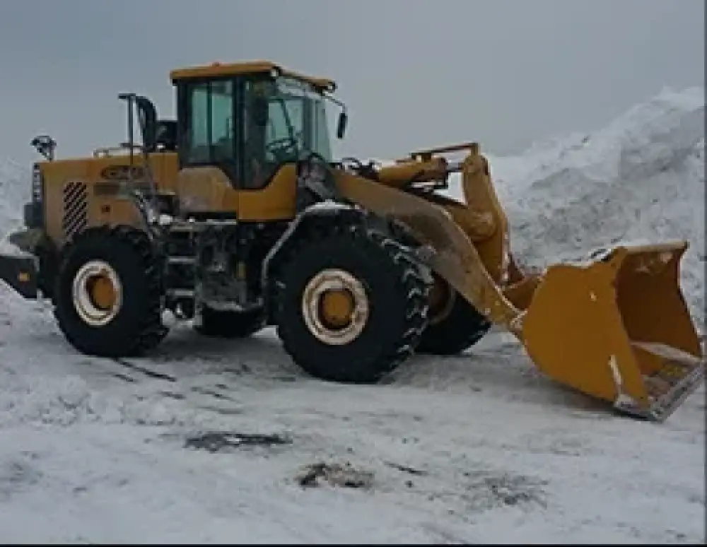 Winter snow plowing service for a business lot