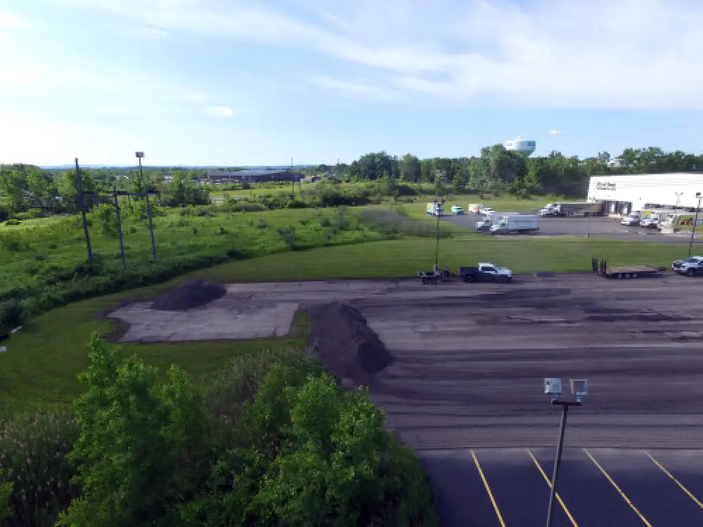 Commercial asphalt milling equipment removing old pavement