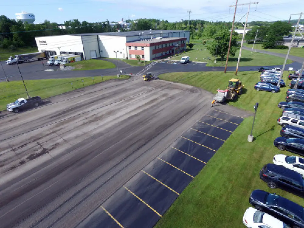Asphalt milling project preparing a parking lot for resurfacing