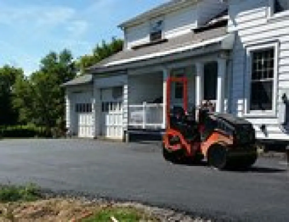 Residential asphalt driveway installation