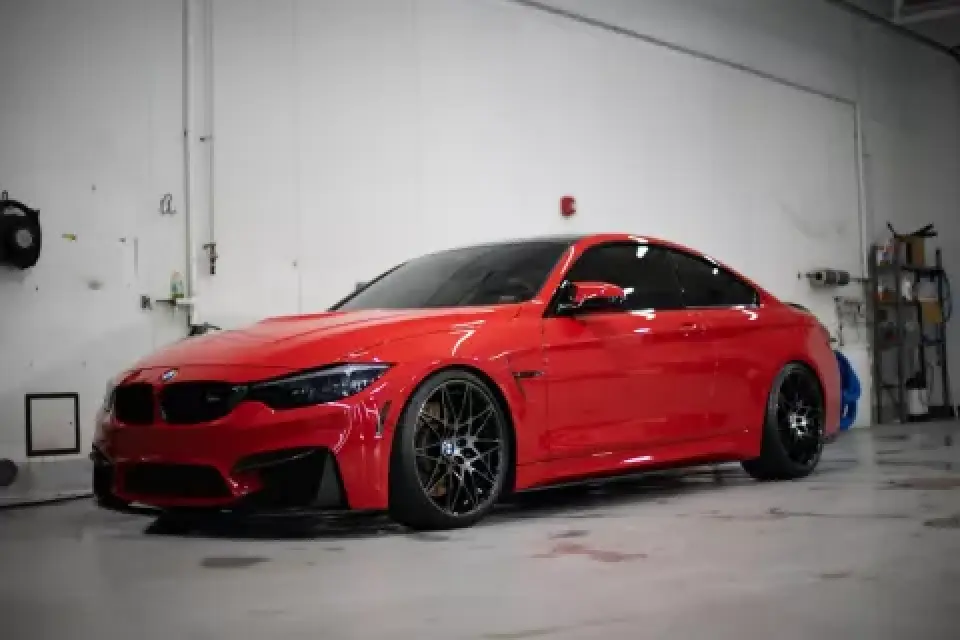 2018 BMW M4 Competition driver side performance coupe profile