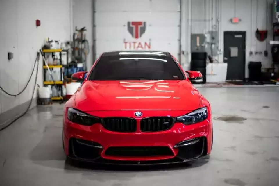 2018 BMW M4 Competition sports coupe exterior driver side view